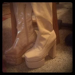 Dolls Kill Pink Patent Thigh High Boots.